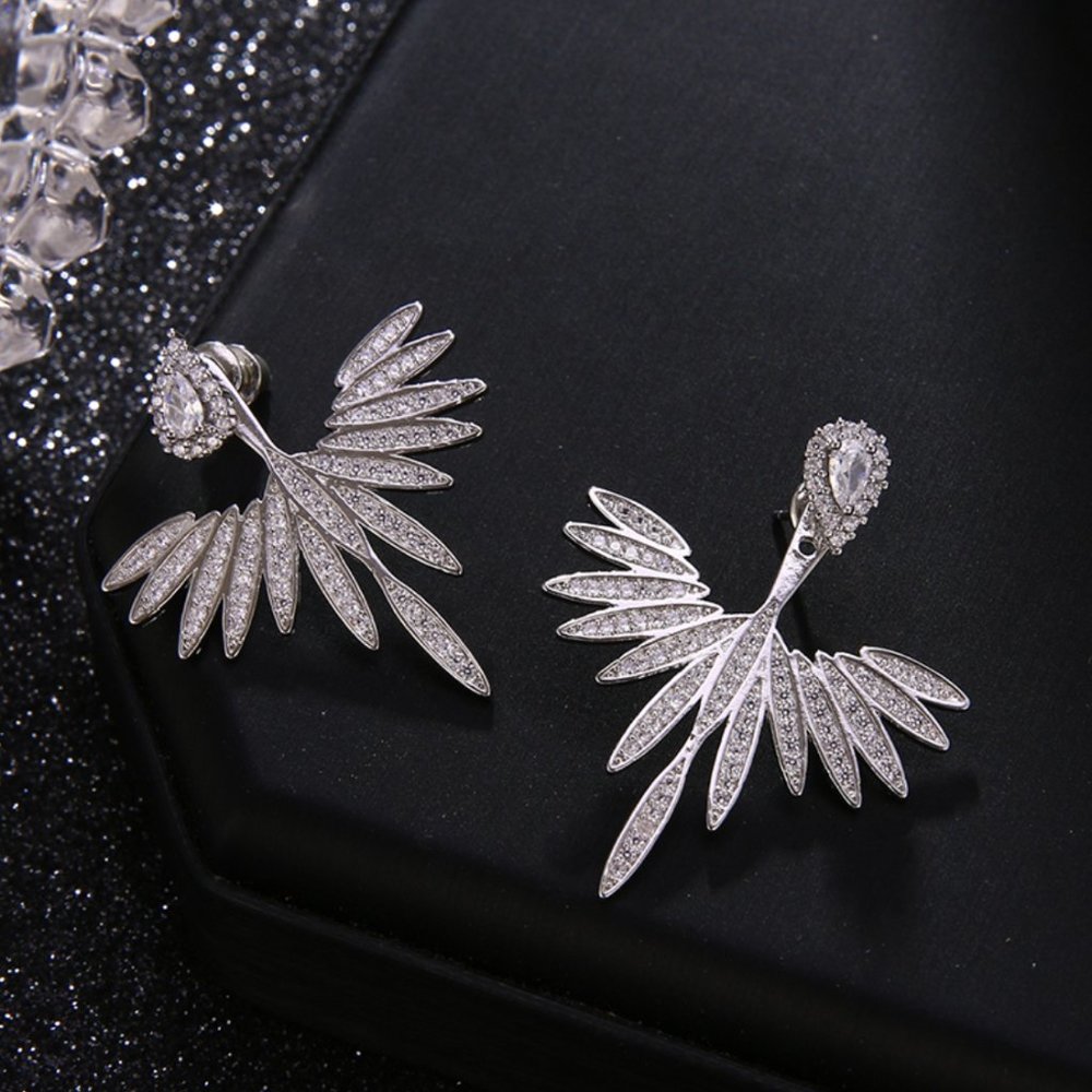 Sparkling winged silver earrings